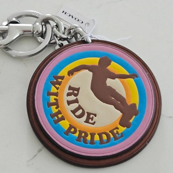 COACH ‘Ride with PRIDE’ Coated Canvas & Fine Leather Keychain Purse Charm NWT - Picture 1 of 2